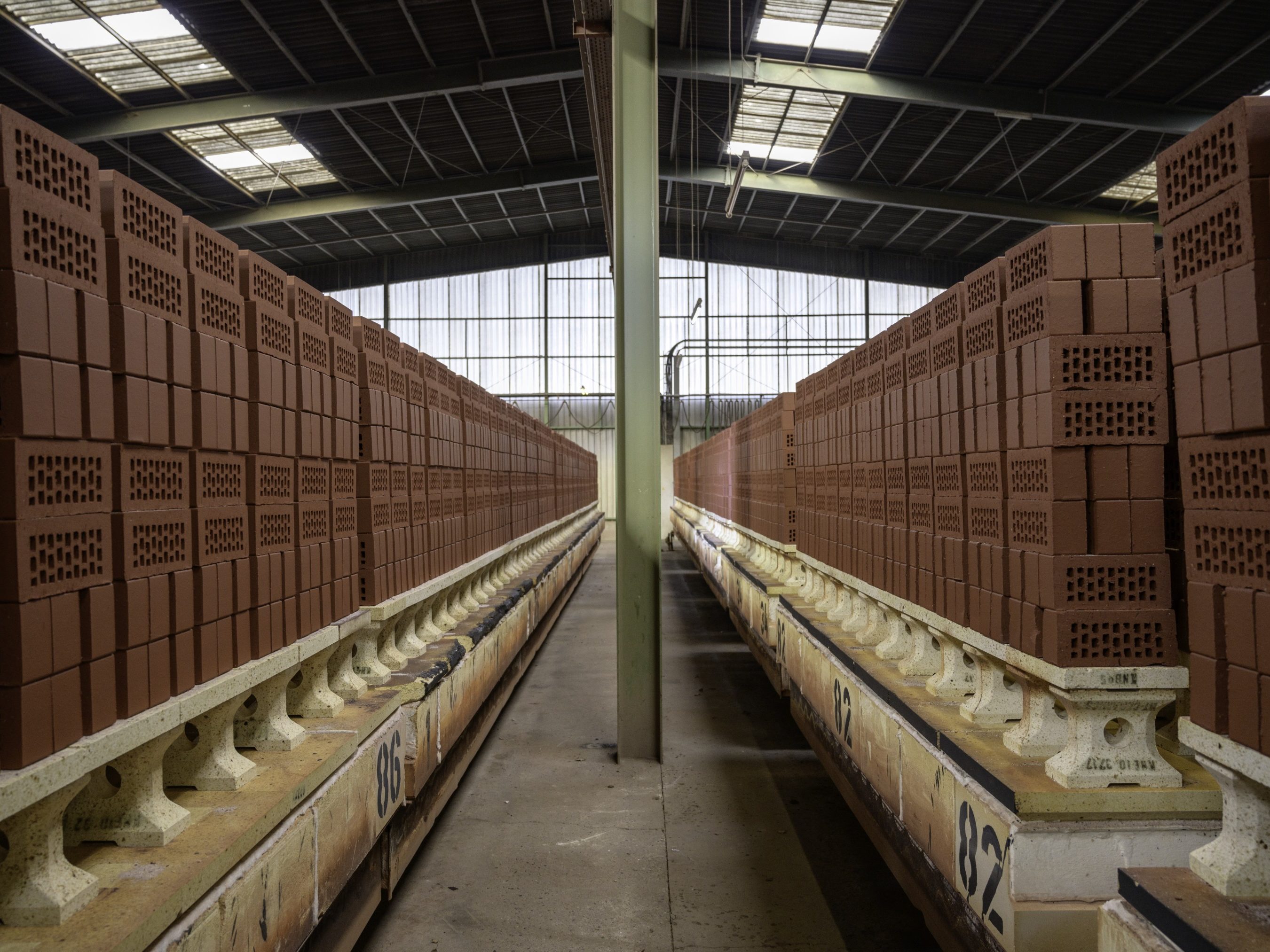 Kiln car with piles of facing bricks ready for packing